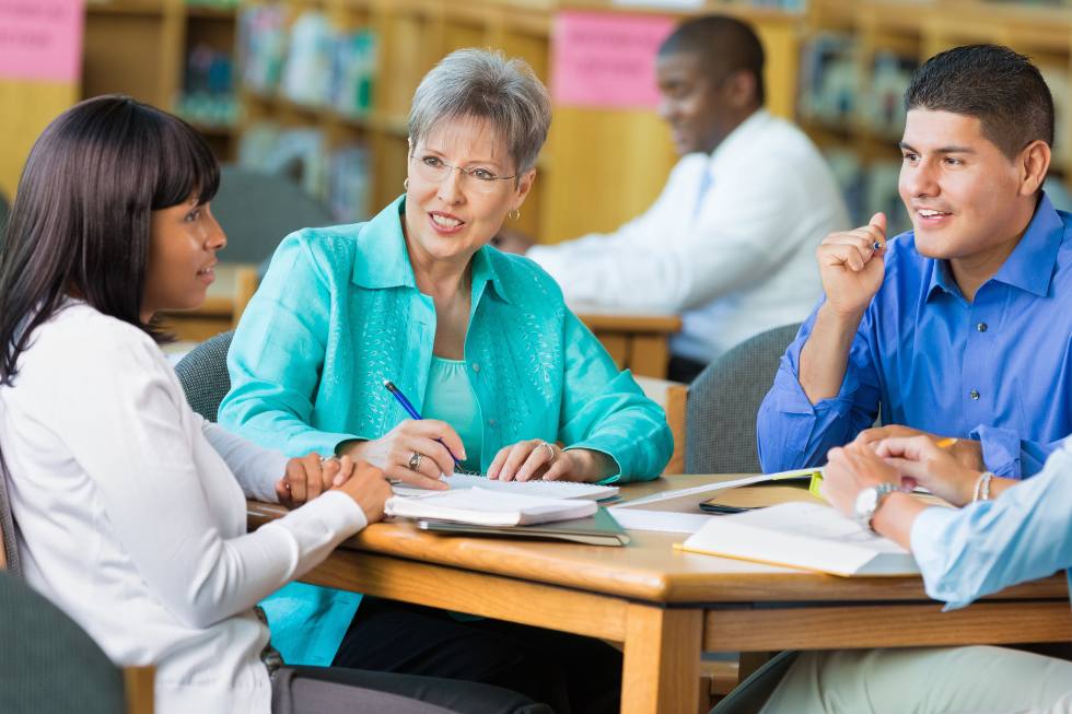 Group of teachers having a meeting at school.